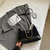 Bolso cubo único con patrón de diamantes para mujer, nuevo otoño 2026, moda vintage de alta gama, para hombro, cruzado y de mano
