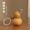 Peça de Mão de Cabaza Natural com Design Versátil, Adequada como Acessório de Bolsa para Homens e Mulheres, um Brinquedo para Alívio do Estresse para Mãos Pequenas