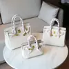 Bolso de Mano de Cuero Genuino con Hebilla Chapada en Oro Platino Patrón Lichi Gran Capacidad Bolso Tipo Kelly para Mujer 2026 Nuevo Bolso de Hombro de Moda Tendencia