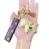 Año del Caballo Nuevo Oro Puro 999 Llavero de Riqueza Instantánea Colgante para Bolso Adorno de Cuero Creativo Fabricante Venta al por Mayor