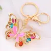 Llavero de Mariposa Colorida Incrustada de Diamantes Anillo de Metal para Llave de Coche Colgante para Bolso de Mujer Llavero Suministro Transfronterizo Venta al por Mayor