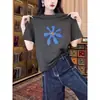 Camiseta Feminina Verão 2026 Versátil Estilosa Design Jovem Algodão Gola Redonda Manga Curta