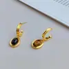 Estilo Maillard vintage Aretes de Piedra Ojo de Tigre otoño e invierno aretes lujo ligero aretes de alta gama aguja de plata 925 nicho ins mujeres