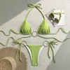 Verão 2026 Novo Comércio Exterior Europeu e Americano Moda Praia Nylon Cor Sólida Argola de Metal Fivela Lateral Biquíni Férias Feminino