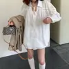 Moda de alta gama para mujer de Dongdaemun, Corea, nuevas llegadas para principios de otoño, diseño simple con un ambiente casual, camisa holgada con nudo al frente