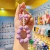 Llavero de coche con borla de cuentas electrochapadas, colgante para teléfono móvil, anillo de pintura de color caramelo lindo, accesorios de perlas, bolsa
