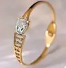 Pulsera de Trébol de Cuatro Hojas Pulsera de Acero Inoxidable para Mujer Pulsera de Acero de Titanio Color Dorado con Diamantes Estilo Blanco y Negro Joyería Que No Se Desvanece Transfronterizo