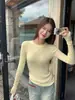 Suéter de punto redondo color amarillo leche para mujer, otoño e invierno, corte ajustado, muestra la figura, capa base interior, camiseta básica, hombro normal, manga larga