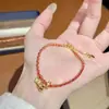 Luz de Corda Vermelha Tecida Design de Nicho de Luxo Vermelho Pulseira de Abóbora de Alta Qualidade Joia Retro Simples Versátil