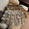 Foto real de ropa coreana de alta calidad para mujer de Dongdaemun: falda de pastel a cuadros de moda de verano para chicas a la moda