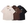 Camisa de Pana Bordada de Manga Corta Estilo Retro Americano Xiaozouju para Hombres y Mujeres Verano Nuevo Holgada Casual Camisa de Pareja