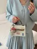 Bolso de mujer de alta gama de nicho, nuevo modelo verano 2026, bolso de hombro y cruzado súper popular, bolso de mano superventas para chicas, bolso Kelly