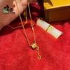 Tienda de Oro Mismo Estilo Collar de Cintura Pequeña con Borla de Escamas de Dragón para Mujer Diseño de Nicho Colgante para Clavícula Collar de Cuentas de Transferencia