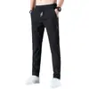 Comercio Exterior Transfronterizo Pantalones Casuales Estilo Coreano para Hombre de Seda Helada Talla Grande Tendencia de Moda Suministro de Comercio Exterior Stock Mayorista Pantalones Rectos