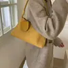 Bolsa nicho 2026 súper caliente otoño gamuza estilo coreano moda bolso de mano versátil nuevo modelo axila un solo hombro temperamento simple