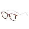 T22008 nuevo marco TR pata de titanio gafas planas anti-luz azul marco de gafas moda femenina caja de uñas de arroz se puede equipar con gafas de miopía hombres