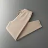 Pantalones de cachemir con cintura elástica al por mayor transfronterizos para hombre, pantalones de lana de punto gruesos de color liso, pantalones de vestir casual con puño