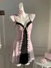 Vestido Transfronterizo Europeo y Americano Estilo Chica Pura Deseo 2026 con Estampado, Cintura Ajustada, Sin Tirantes, Cuello en V Profundo y Bordes con Volantes