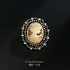 Moda europea y americana broche de belleza de pedrería para la cabeza aleación chapada corsage retro accesorios para ropa de mujer pin venta al por mayor