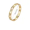 Pulsera de acero de titanio incrustada con diamantes para mujer, trébol de cuatro hojas dorado lleno de diamantes, pulsera de lujo ligero, estilo europeo y americano, acabado espejo, cierre que no se decolora