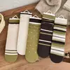 Nuevos calcetines a rayas de bloques de color otoño e invierno para mujer, calcetines apilados de encaje con lunares verde café, calcetines versátiles de moda japoneses de media pantorrilla