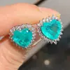 Huajie exquisitos pendientes de plata de ley 925 con forma de corazón y diamantes verdes, pendientes de moda para mujer para vacaciones, venta al por mayor de fábrica