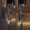 Falda midi con abertura para mujer, falda de cuero, nuevo estilo popular otoño e invierno 2026, longitud media, por encima de la rodilla, cintura alta, recta, ajustada al cuerpo