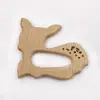 Suministro directo de fábrica palo para morder dientes de bebé Madera de haya diente calmar forma de animal palo para morder dientes morder música