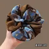 Goma para el pelo scrunchie floral vintage para mujer, accesorio para el pelo de estilo casual y de alta gama, nuevo modelo 2026 para moño