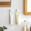 Clip de gancho blanco sin costuras estilo japonés para baño, clip adhesivo fuerte para limpiador facial y pasta de dientes
