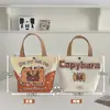 Nueva Bolsa de Lona Estilo Dibujo Animado Linda Gatito Bolso de Mano para Estudiante Versátil de Verano Ropa de Trabajo Bolsa de Gran Capacidad