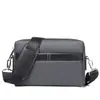 Bolso Pequeño Cuadrado de Comercio Exterior Transfronterizo 2026 Nuevo Modelo Bolso de Mano Gran Capacidad Moderno Cartera de Tela Oxford para Hombre Venta al por Mayor