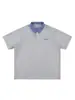 Camiseta a Cuadros de Empalme Contrastante Estilo Coreano de Manga Corta para Hombre Verano 2025 Nuevo Retro Holgada Ajustada Cuello Polo