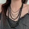 Colar de Corrente de Bolas Escuro Multi-Camadas de Luxo Leve Design de Moda Feminina Colar Empilhado Design de Nicho Corrente da Clavícula