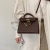 Bolso bandolera de hombro retro de lujo ligero para mujer, moda 2026, nuevo bolso cuadrado tipo Kelly coreano, simple