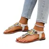 Nuevas sandalias cruzadas para mujer de talla grande, estilo étnico con cuentas de suela plana, chanclas de playa para exteriores europeas y americanas, zapatos de mujer en negro