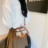 Bolso de accesorios para niños, popular en Europa y América, con colores contrastantes, mini bolso de venta personalizado para niñas, bolso bandolera de princesa a la moda.