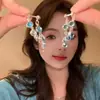 ¡Ah, me encantan los pendientes azules del año! ¡Cada estilo tiene una atmósfera navideña única!