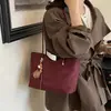 Bolsa de mão grande e moderna para mulheres 2026 novo modelo simples bolsa tote de moda diária bolsa de ombro de grande capacidade moderna