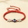 Pulsera Explosiva Transfronteriza Europea y Americana Femenina Ojo Turco Palma Ojo Azul Ojo Turco Cuerda Roja Tejida Pulsera Ajustable