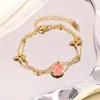 Pulsera de Acero de Titanio Chapado en Oro Real de Cuatro Hojas de Doble Capa de Venta Caliente Transfronteriza Europea y Americana Joyería de Acero Inoxidable de Alta Gama que No se Desvanece