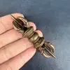 Ornamento de vajra de latão estilo Xizang, peça de mão de vajra vintage de cinco pontas, pilão mágico esotérico artesanato decorativo atacado