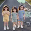 Nuevo Estilo Moda Casual para Niñas Cuello Redondo Manga Corta Pantalones Cortos Rayados para Niños Conjunto de Top y Shorts para Bebé de Verano