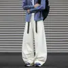 Pantalones de mujer de estilo americano de alta gama, plisados, corte curvo, nuevos pantalones de pierna ancha para la primavera 2026, pantalones casuales sueltos y con caída.