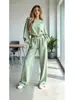 Conjunto de sudadera casual de moda de alta gama de color liso, manga corta y larga, y pantalones anchos elásticos, nuevo para otoño e invierno 2026 en Europa y América