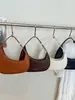 Bolso de mano tipo dumpling de diseño de nicho transfronterizo, nuevo modelo de verano 2026, bolso de axila versátil de alta gama, bolso de mano y bolso cruzado a la moda