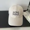 Nueva gorra de béisbol de moda estilo coreano bordada con letras para mujer, primavera/verano, versátil para parejas, hace que la cara se vea más pequeña, protector solar, gorra de pico moderna para hombre