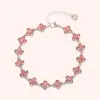Pulseira de Trevo de Quatro Folhas com Pedras Totais de Alta Versão Moda Transfronteiriça para Meninas, Luxo Acessível e Pulseira de Flor de Aço Titânio Estilo Ins de Alta Qualidade
