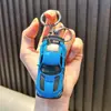 Chaveiro pingente de carro esportivo Huili pingente para bolsa de carro modelo chaveiro liga metálica brinquedo pequeno presente pequeno atacado