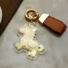 Hazte Rico Inmediatamente, Llavero de Oro Puro, Colgante de Pony Dorado del Zodiaco de Dibujos Animados, Colgante Versátil y Lindo Regalo para Parejas